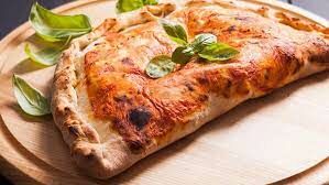 Как называется закрытая форма пиццы в виде полумесяца?