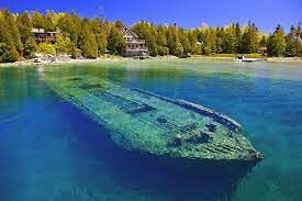 Какова максимальная глубина озера Гурон, которое является вторым по площади в США?